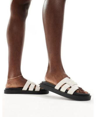 schuh Timmy flat sandals in ecru croc-White