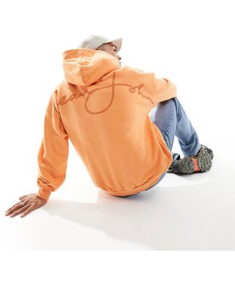 Sean John script pullover hoodie in orange with chest print