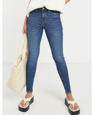 Selected Femme cotton blend Sophia skinny jeans with mid rise in dark blue - MBLUE