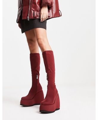 Shellys London wedge knee boots in red stretch scuba