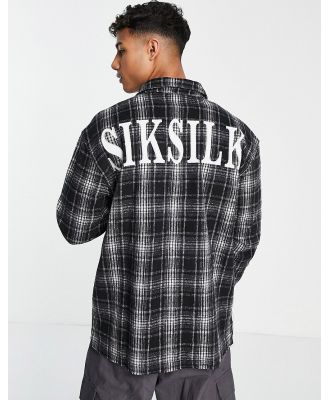 SikDilk long sleeve flannel shirt in checked black
