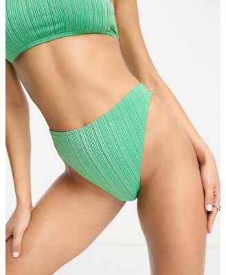 South Beach high leg bikini bottoms in green glitter