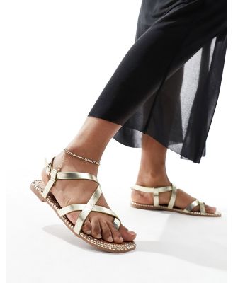 South Beach strappy sandals with whipstitch detail in gold