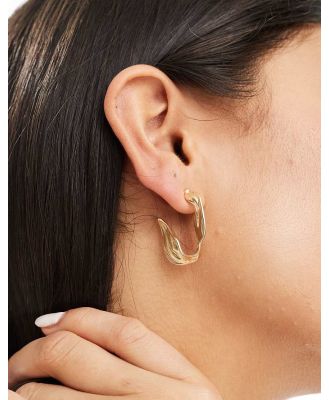 SVNX half moon gold hoops with melted metal detail