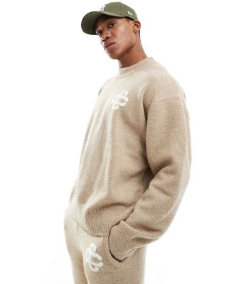 The Couture Club fluffy emblem jumper in beige-Grey