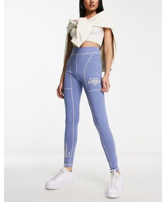 The Couture Club graphic leggings in light blue (part of a set)