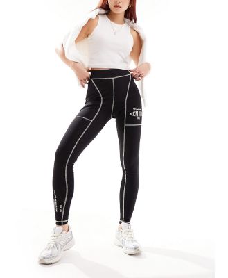 The Couture Club graphic leggings with contrast stitch in black-Blue