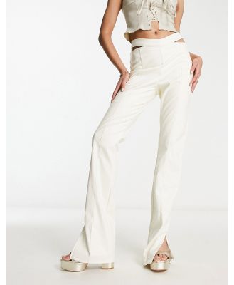 The Couture Club high waisted cut out pants in cream-White