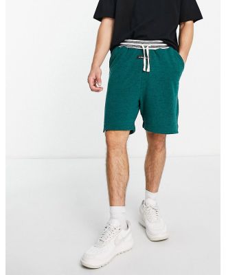 The Couture Club jersey shorts in green teddy fleece (part of a set)