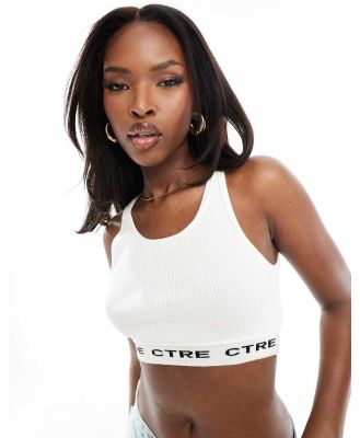 The Couture Club logo knitted singlet crop top in cream-White