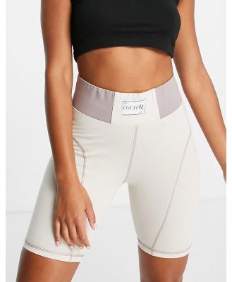 The Couture Club lounge legging shorts with woven label in off white (part of a set)