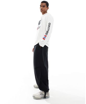 The Couture Club motocross graphic long sleeve t-shirt in white
