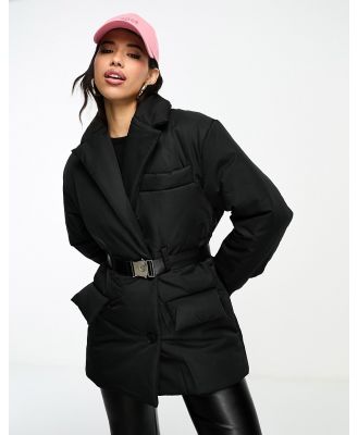 The Couture Club padded coat in black with belt