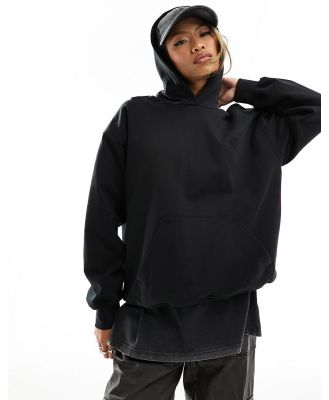 The Couture Club relaxed emblem hoodie in black