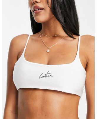 The Couture Club scoop logo bikini top in white