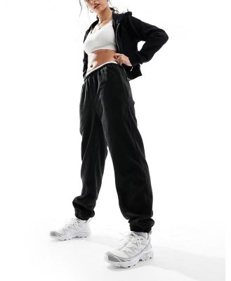 The Couture Club teddy fleece trackies in black