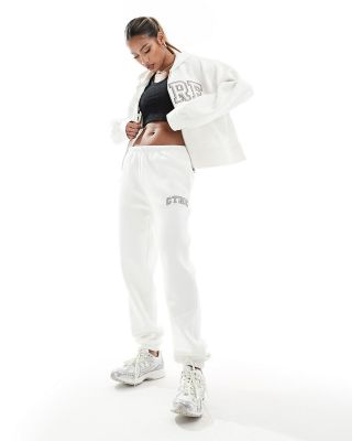 The Couture Club varsity trackies in off white (part of a set)