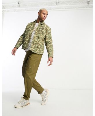 The North Face Heritage loose fit utility pants in khaki-Green