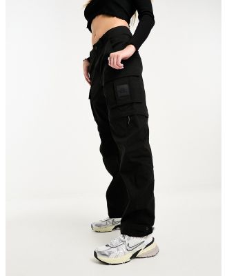 The North Face NSE Convin loose fit zip off cargo pants in black