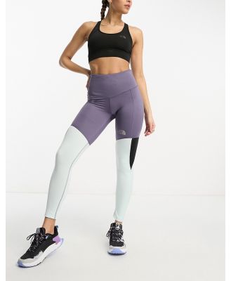 The North Face Running high waist contour seam leggings in purple and blue