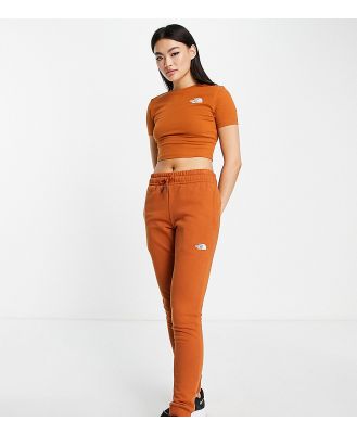The North Face skinny trackies in brown Exclusive at ASOS