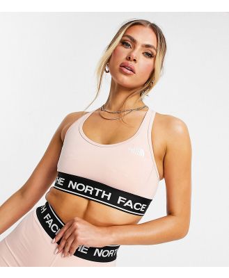 The North Face Tech sports bra in light pink Exclusive to ASOS