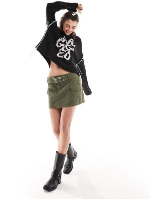 The Ragged Priest high neck logo jumper with side splits-Black
