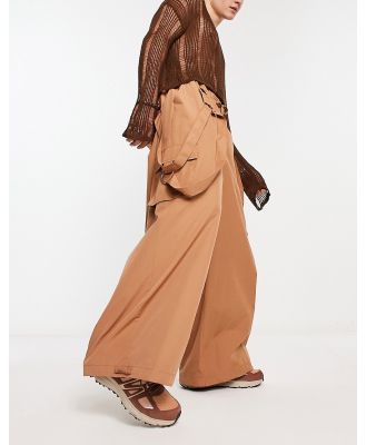The Ragged Priest relaxed parachute pants with strap detail-Brown