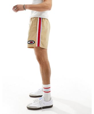 Tommy Jeans archive runner shorts in sand-Neutra