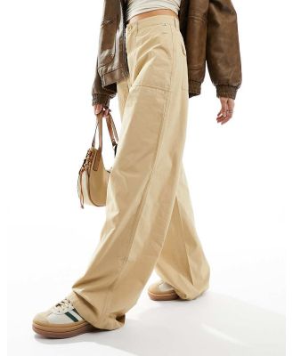 Tommy Jeans Claire high rise wide cargo pants in sand-Neutral