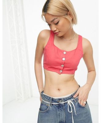 Tommy Jeans cropped flag logo denim top in pink (part of a set)