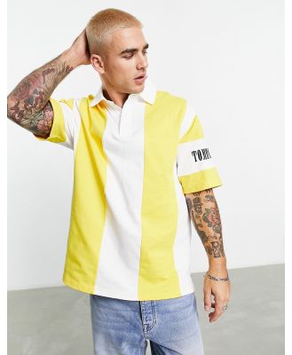 Tommy Jeans oversized archive logo polo shirt in yellow stripe