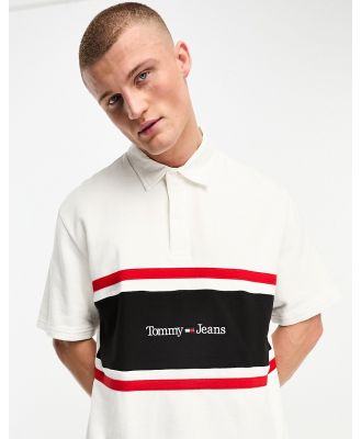 Tommy Jeans vertical stripe linear logo polo shirt in white