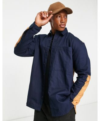 Topman long sleeve relaxed fit panelled shirt with quilting in navy and tobacco