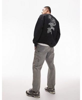 Topman oversized fit sweatshirt with front and back floral placement embroidery in washed black