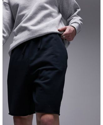 Topman oversized shorts with raw hem in washed black
