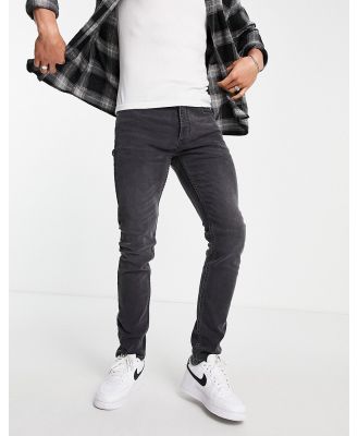 Topman stretch skinny jeans in washed black