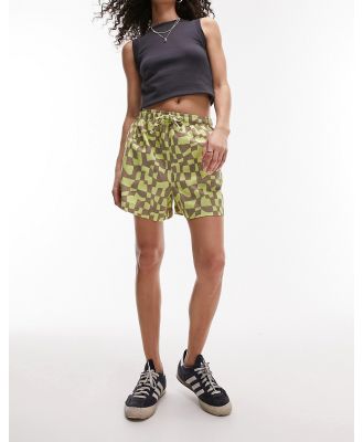 Topshop abstract checker print runner shorts in green