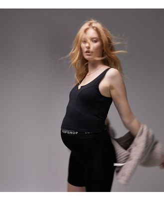 Topshop Maternity branded elastic legging shorts in black