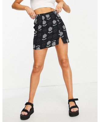 Topshop split front star flower mini skirt in monochrome-Black