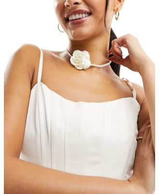 True Decadence pearl choker with rose corsage in white