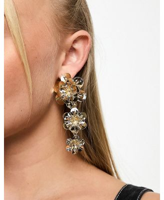 True Decadence statement flower drop earrings in gold