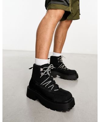Truffle Collection chunky hiker boots with bungee cord detail in black