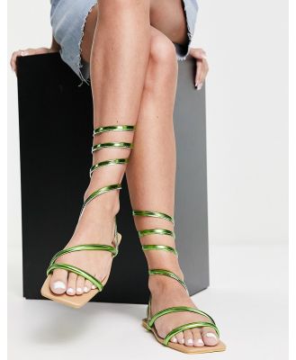 Truffle Collection wrap around minimal sandals in green metallic