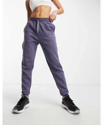 Under Armour Essential Script trackies in navy