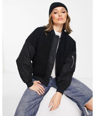 Urban Classics oversized sherpa mix bomber jacket in black