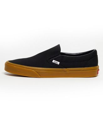 Vans classic slip on gum sole sneakers in black