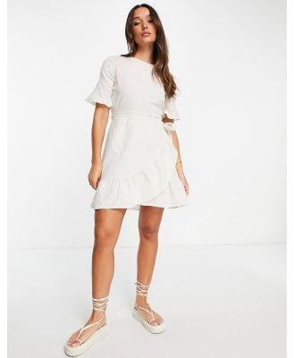 Vero Moda cotton wrap front mini dress in cream-White