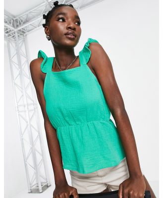 Vero Moda crinkle jersey blouse with frill detail and v back in green