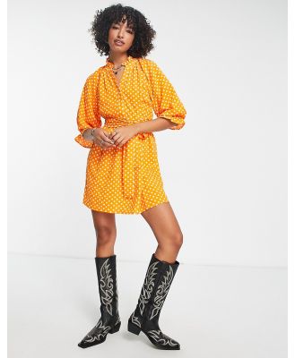 Vero Moda long sleeve v neck mini dress with shirred cuffs and high neck in orange print